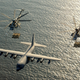 Illustration for article titled This Is A Plane Thats Refueling A Helicopter Thats Carrying A Hummer